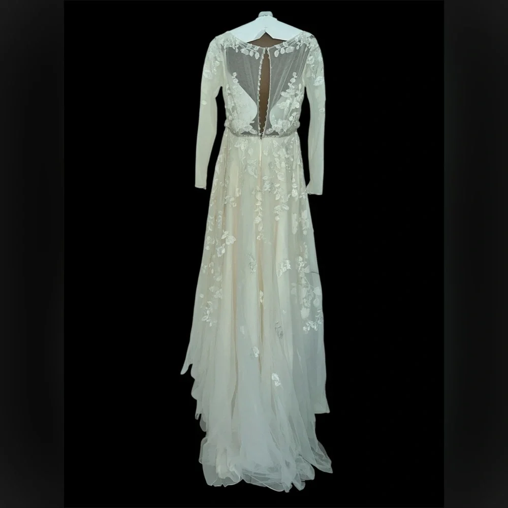 Elegant Ivory Long Sleeve Illusion Wedding Dress with Timeless Charm - Picture 4 of 11